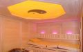 Massivholz-Sauna - Innenansicht mit LED-Beleuchtung, rosa