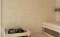 Massivholz-Sauna in Fichte mit Glasfront und Einrichtung in Nussbaum-Design - Saunaofen